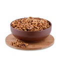 Walnuts in brown bowl on wood board isolated on white background, copy space. Royalty Free Stock Photo