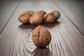 Walnuts on the brown wooden table