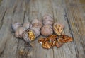 Walnuts closeup on a wooden background, selective focus Royalty Free Stock Photo