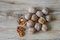 Walnuts closeup on a wooden background, selective focus Royalty Free Stock Photo