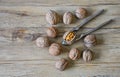 Walnuts closeup on a wooden background, selective focus Royalty Free Stock Photo