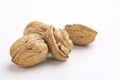 Walnuts and cracked walnut, isolated on white background Royalty Free Stock Photo