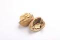 Walnuts and cracked walnut, isolated on white background Royalty Free Stock Photo