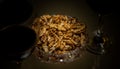 Walnuts in dish with two red wine in glass Royalty Free Stock Photo