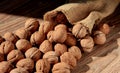 Walnuts are emptied out of the bag. Scattered nuts