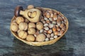 Walnuts and hazelnuts on an imitation marble table