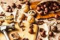 Walnuts and hazelnuts are on the table. Whole and broken nutshells lie on a brown background Royalty Free Stock Photo