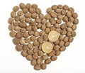 Walnuts heart shaped with two sliced lemons Royalty Free Stock Photo