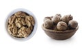 Walnuts isolated on white background. Heap of walnuts isolated on white background. Walnut in a wooden bowl on white background. Royalty Free Stock Photo