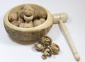 Walnuts. Nuts of walnuts with nutcracker. white backgro Royalty Free Stock Photo