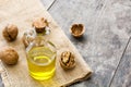 Walnuts oil on wood Royalty Free Stock Photo