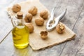 Walnuts oil on wood Royalty Free Stock Photo