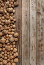 Walnuts on old vintage wooden background. Wood boards. Natural wood. Rustic style. The view from the top. Space for text Royalty Free Stock Photo