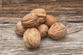 Walnuts on old wooden background