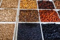 Walnuts, pistachios, bodom, dried apricots, prunes, raisins are sold in boxes at the Chorsu bazaar in Tashkent in Uzbekistan