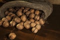 Walnuts on a rustic old wooden table. walnuts on a wooden table. Side view. Royalty Free Stock Photo