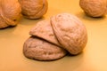 Walnuts shell on each other on the background of walnuts