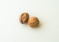 Walnuts in shell on a white background Royalty Free Stock Photo