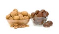 Walnuts and sweet chestnuts on a white background