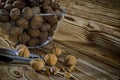 Walnuts are on the table next to a bowl of Nuts Royalty Free Stock Photo