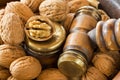 Walnuts in vintage wooden nut bowl with brass Nutcracker gavel h