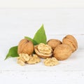 Walnuts walnut nuts square on wooden board Royalty Free Stock Photo