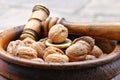 Walnuts in a wooden bowl Royalty Free Stock Photo