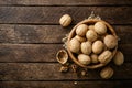 Walnuts in wooden bowl on dark rustic background Royalty Free Stock Photo