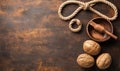 Walnuts, wooden bowl, and rope on rustic table, top view, food background Royalty Free Stock Photo