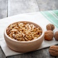 Walnuts in wooden bowl Royalty Free Stock Photo