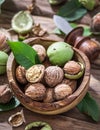 Walnuts in the wooden bowl. Royalty Free Stock Photo