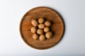 Walnuts on wooden utensils. Close up view of walnuts. Walnuts are 4 water, 15 protein, 65 fat and 14 carbohydrates, including 7