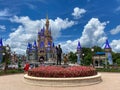 The Walt Disney and Mickey Mouse partner statue in front of Cinderella`s castle in Magic Kingdom