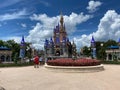 The Walt Disney and Mickey Mouse partner statue in front of Cinderella`s castle in Magic Kingdom Royalty Free Stock Photo