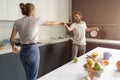 Waltzing in a new home young couple dancing celebrating their new purchase of buying their own house. Happy new family Royalty Free Stock Photo