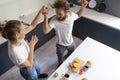 Waltzing in a new home young couple dancing celebrating their new purchase of buying their own house. Happy new family Royalty Free Stock Photo