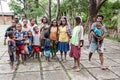 Wamena, Indonesia - January 9, 2010: People of the Dani tribe in a usual dress standing in Dugum Dani Village. Baliem Valley Papua