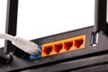 WAN port cable and LAN ports connector on the back panel of Dual Band Gigabit Wi-Fi 6 Router or Wireless AX router isolated on