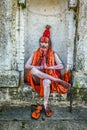 Wandering Shaiva sadhu (holy man) in ancient Pashupatinath Temlep Royalty Free Stock Photo