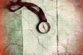 wanderlust and explore concept, compass on map, top view, vintage toned image, space for text Royalty Free Stock Photo
