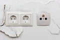 Wall plaster loosens around sockets