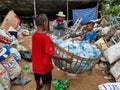 Family working at waste disposal site