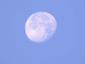 Waning moon in blue color sky in morning