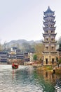 Wanming Pagoda with the Tuojiang River Tuo Jiang River in Fenghuang old city Phoenix Ancient Town,Hunan Province, China
