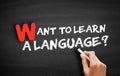 Want to Learn a Language? text on blackboard Royalty Free Stock Photo