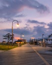 Wantagh, New York - July 11, 2020 : Dusk light over the charter fishing boats at Captree fishing pier. Royalty Free Stock Photo