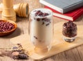 Wantan Red Bean Thick Soy Milk served in glass isolated on table top view of asian food Royalty Free Stock Photo