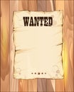 Wanted empty poster. paper on light coloured wooden fence.