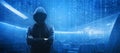 Wanted Hacker is Coding Virus Ransomware Using Abstract Binary Code. Cyberattack, System Breaking and Malware Concept. Royalty Free Stock Photo