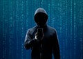 Wanted Hacker is Coding Virus Ransomware Using Abstract Binary Code. Cyberattack, System Breaking and Malware Concept. Royalty Free Stock Photo
